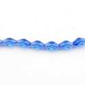 Glaskraal met facetten, ovaal, blauw, 12 x 6 mm (streng)